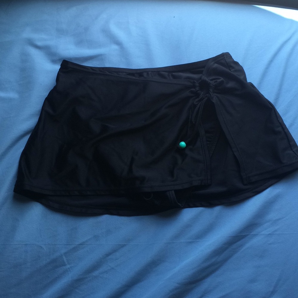 Black swimsuit bottom with skirt and tie slit